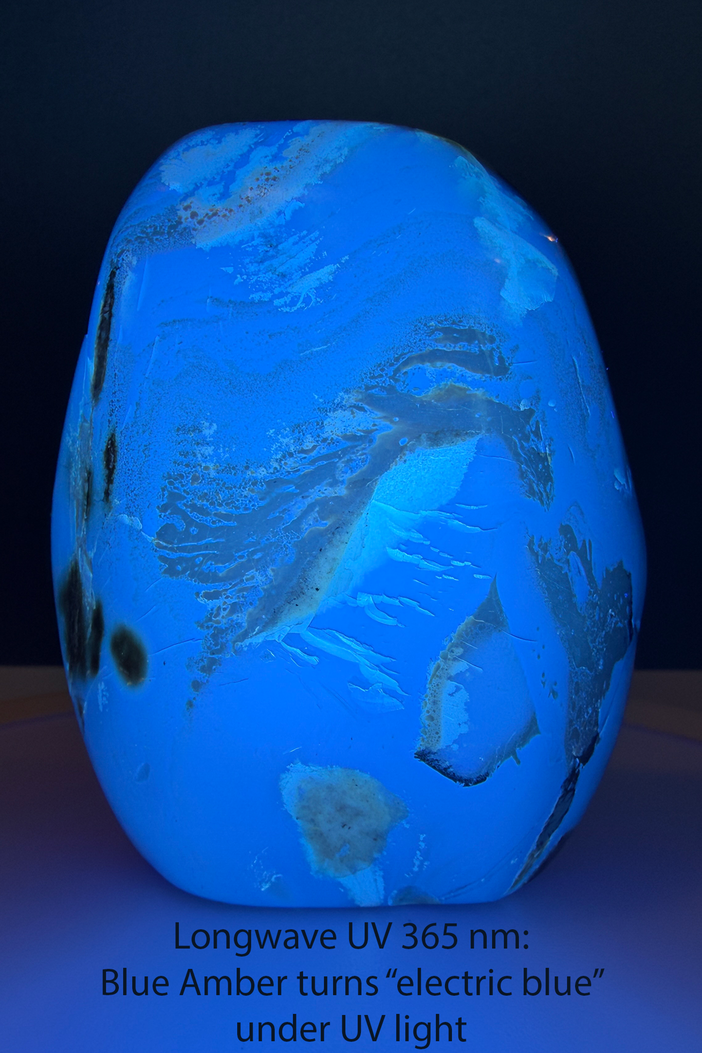 Indonesian Blue Amber Freeform with Strong Sunlight and Fluorescent Blue Shift