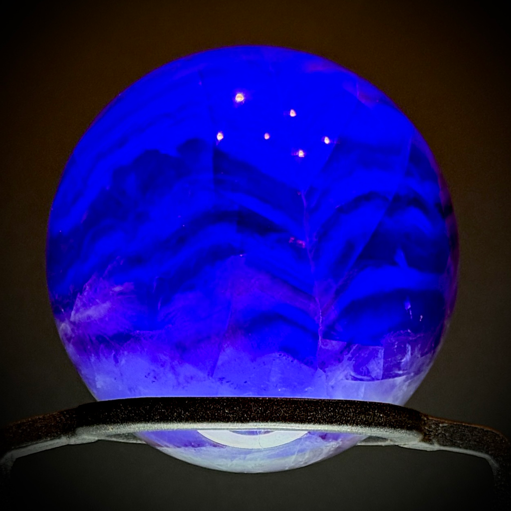 Translucent Fluorite Sphere with Strong Fluorescent Glow