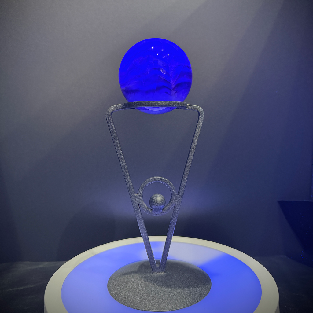 Translucent Fluorite Sphere with Strong Fluorescent Glow