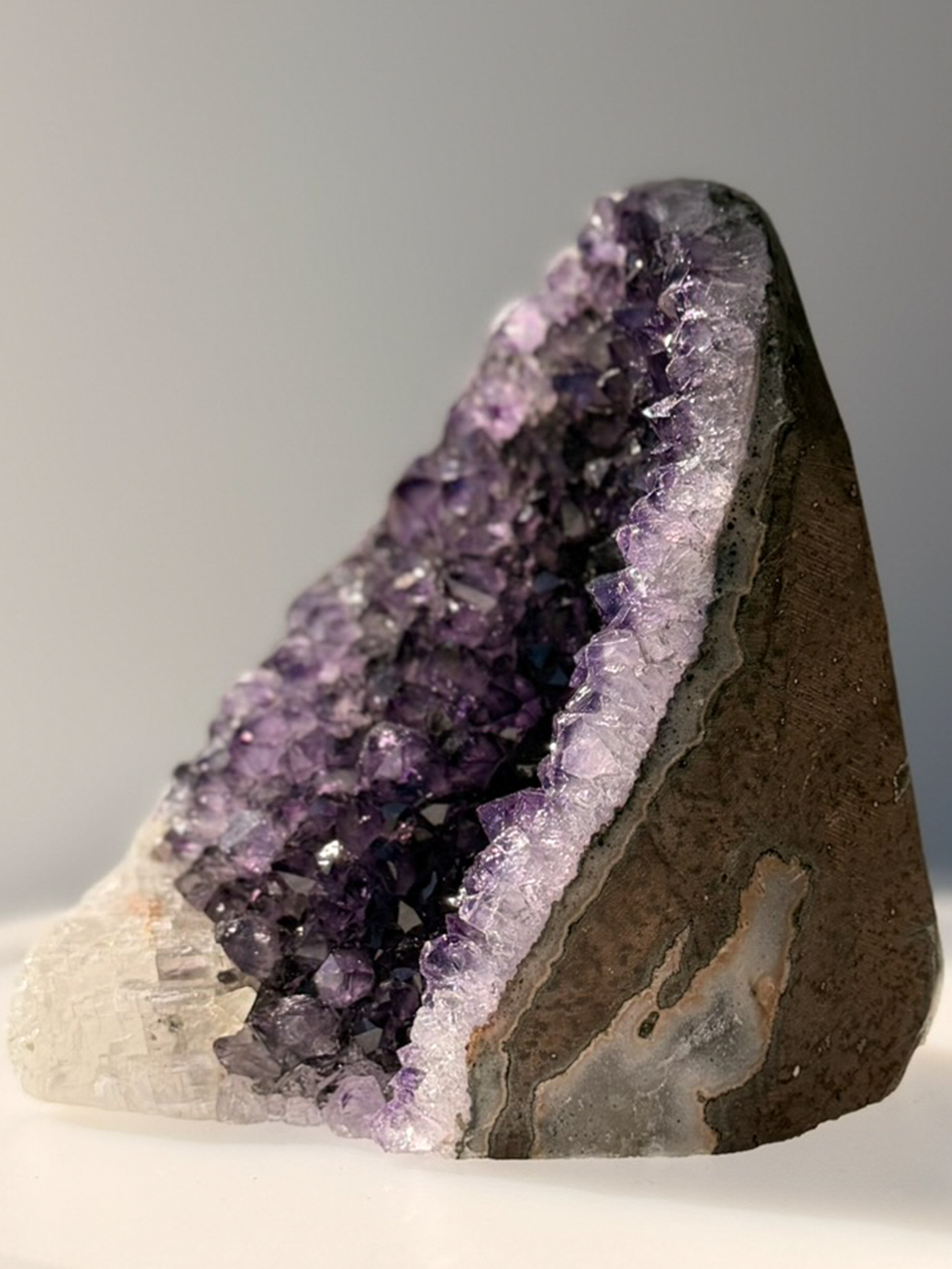 Brazilian Amethyst Cut Base with UV-Reactive Calcite and Polished Agate Rim